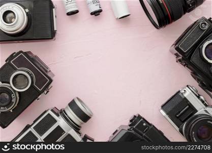 border from cameras film pink background