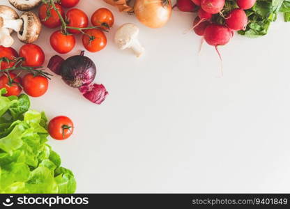 Border from vegetarian ingredients for cooking on white wooden table. Copy space. Top view