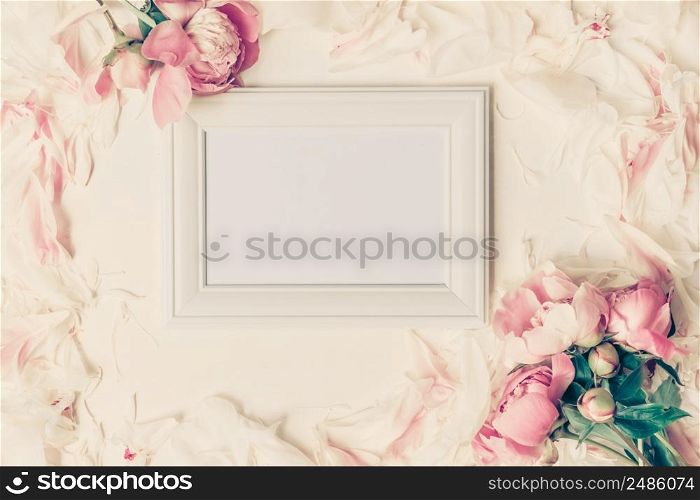 Border of Beautiful retro pink and white peony flowers with decorative white frame with copy space for your text. Border of Beautiful retro pink and white peony flowers with decorative white frame with copy space for your text.