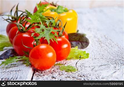Border of healthy Bio Vegetables on a Wooden Background