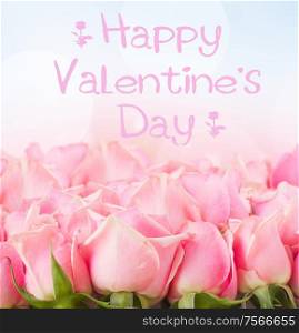 border of pink garden roses on blue sky background with happy Valentines Day greeting. border of pink garden roses