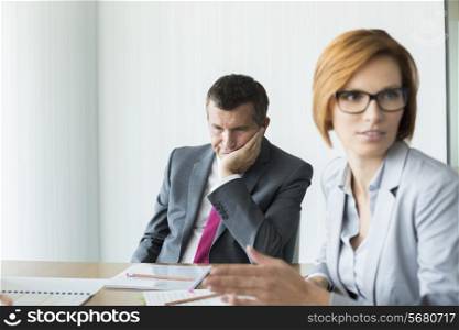 Bored businessman in conference meeting