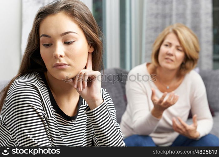 Bored Teenage Girl Being Told Off By Mother