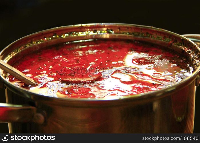 borsch Ukrainian red in a pan with a scoop. borsch fresh Ukrainian red. full pan of delicious red borsch with scoop