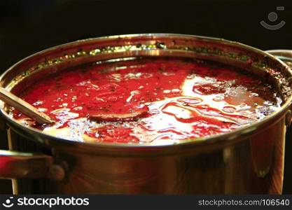 borsch Ukrainian red in a pan with a scoop. borsch fresh Ukrainian red. full pan of delicious red borsch with scoop