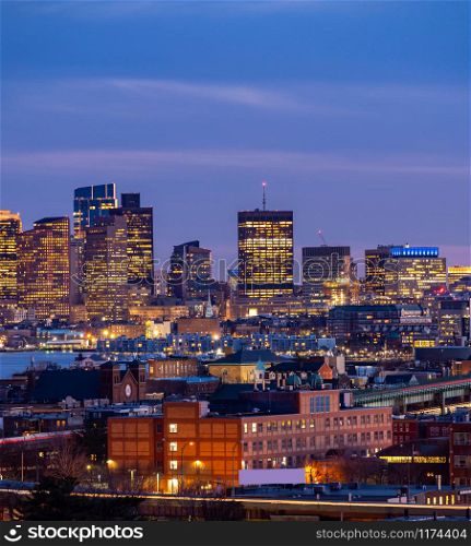Boston Cityscape with highway trail to Boston MA USA at night.
