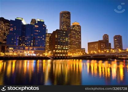 Boston Harbor skyline and waterfront at dusk, financial district