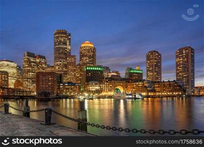 Boston skyline from Fan Pier at the fantastic twilight time with smooth water river in boston, Massachusetts, USA downtown skyline, Architecture and building with tourist and travel concept