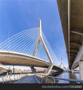 Boston Zakim bridge over Charles river around Boston bay harbor at Boston downtown MA USA. Boston is the capital and most populous cityof the Commonwealth of Massachusetts in the United States