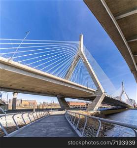 Boston Zakim bridge over Charles river around Boston bay harbor at Boston downtown MA USA. Boston is the capital and most populous cityof the Commonwealth of Massachusetts in the United States