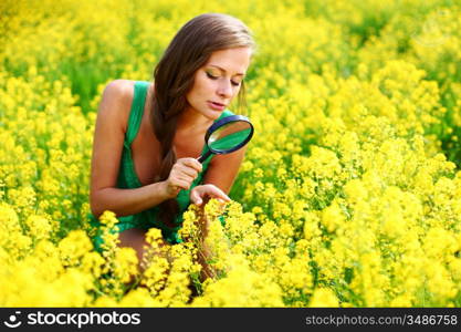 botanist woman in yellow flower field