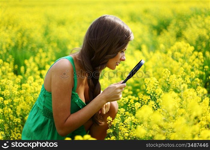 botanist woman in yellow flower field