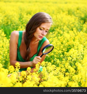 botanist woman in yellow flower field