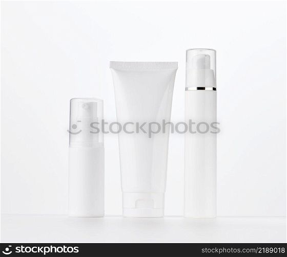 bott≤, empty white plastic tubes for cosmetics. Packaging for cream,≥l, serum, advertising and∏uct promotion, mock up