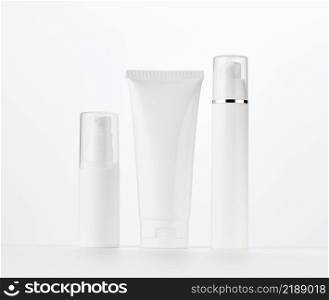 bott≤, empty white plastic tubes for cosmetics. Packaging for cream,≥l, serum, advertising and∏uct promotion, mock up