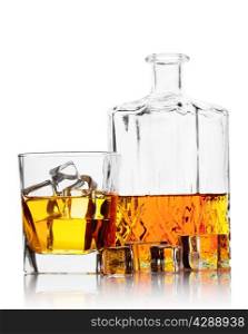 Bottle and a glass of whiskey with ice isolated on white background
