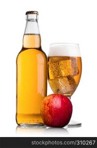 Bottle and glass and ice cubes of apple cider with fresh red apple on white background