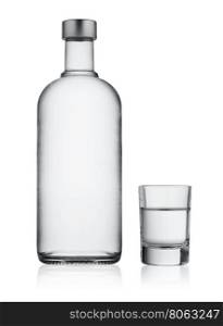 Bottle and glass of vodka isolated on white background. Bottle and glass of vodka