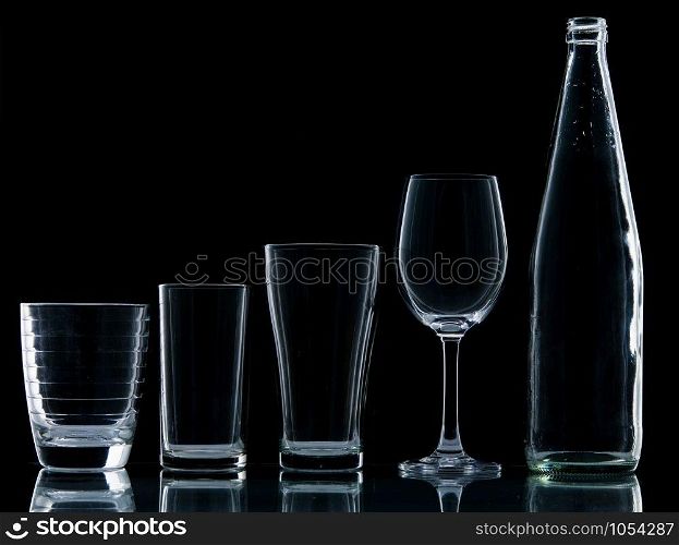 Bottle and Glass water clear isolate on over black background