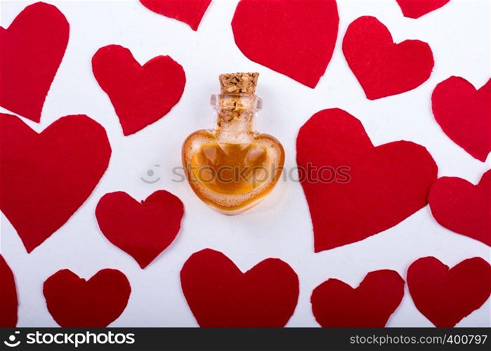 Bottle in heart shape icons as Love concept