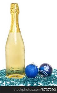 Bottle of champagne and christmas baubles over white background.