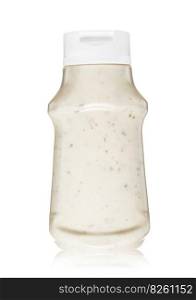 Bottle of classic garlic sauce with spices and herbs on white background.