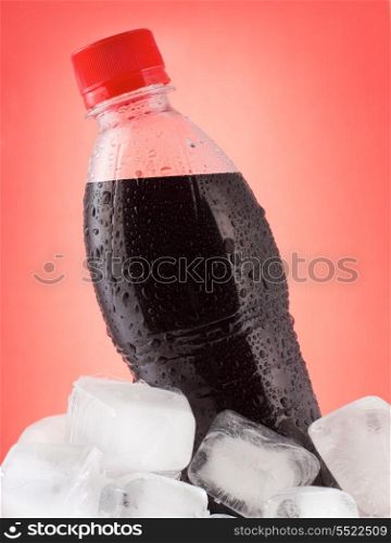 bottle of cola in ice