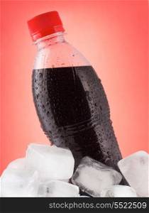 bottle of cola in ice