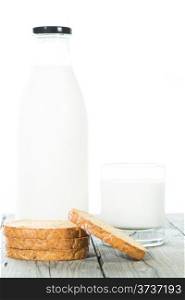 Bottle of fresh milk with toast and with white background