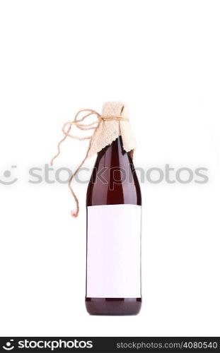Bottle of home brewed craft beer with blank label template isolated on white background
