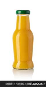bottle of mango juice isolated on a white background. bottle of mango juice