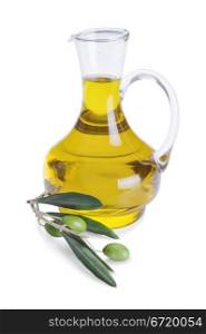 Bottle of olive oil and fresh olive branch with olives isolated on white background