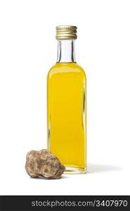 Bottle of olive oil with fresh white truffle on white background