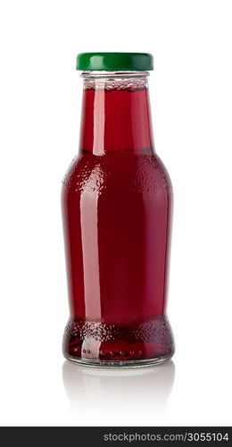 bottle of pomegranate juice isolated on a white background. bottle of pomegranate juice