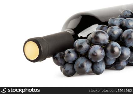 Bottle of red wine with grapes isolated on white background
