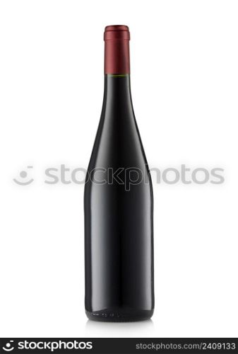 Bottle of red wine with red top on white.