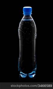 bottle of soda water isolated on a black background