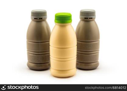 Bottle of soy milk and soy milk with saseme on white background