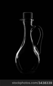 bottle of spiced by a dark background