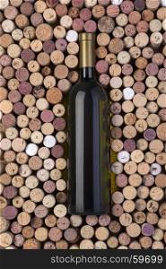 Bottle of white wine and corks on wooden table