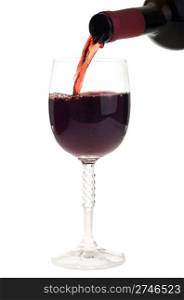 bottle pouring red wine into a crystal glass (isolated on white background)