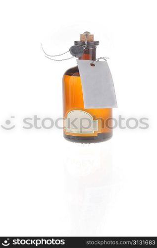 bottle with cosmetic mean closed by stopper isolated on white