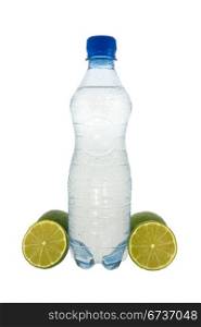 Bottle with mineral water and a green lemons