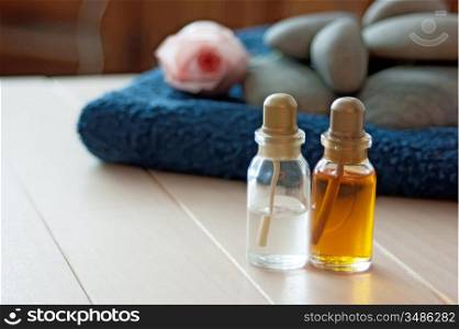 bottle with oil and aroma massage