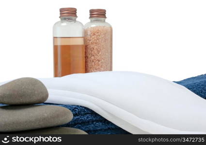 bottle with oil and sea salt in the towel isolated on white backgrounds