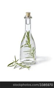 Bottle with Tarragon vinegar on white background