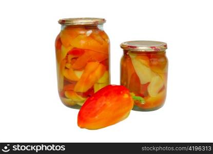 Bottled fruits in jars isolated on white.