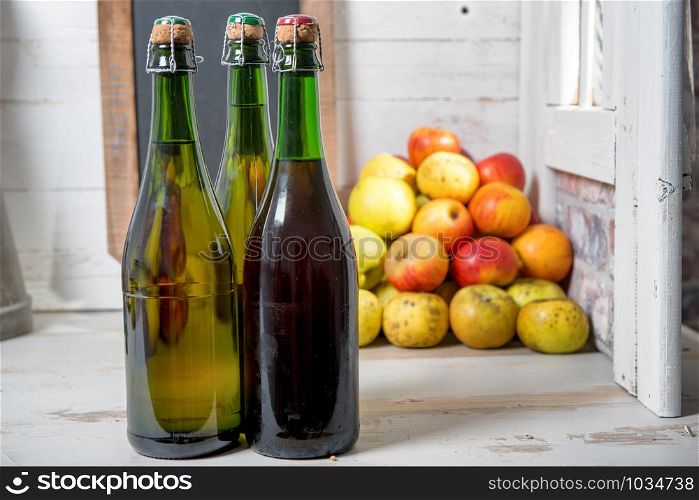 bottles of cider and apples of normandy