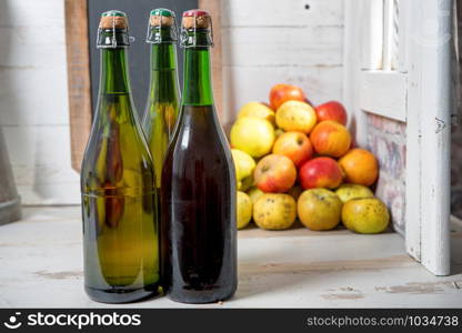 bottles of cider and apples of normandy