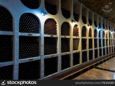 Bottles of high quality wine in the traditional wine cellar